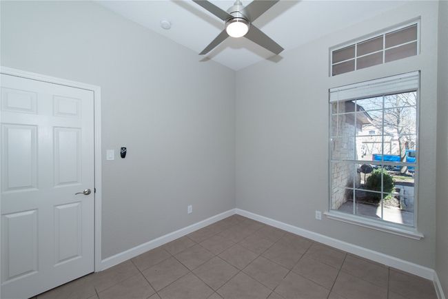 Bedroom 3 of 3 facing right side of property door on left is entrace and just to the left of that is closet door off picture | Image 25