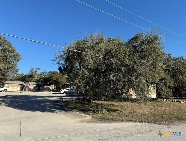 Entrance view of apartment property. | Image 39
