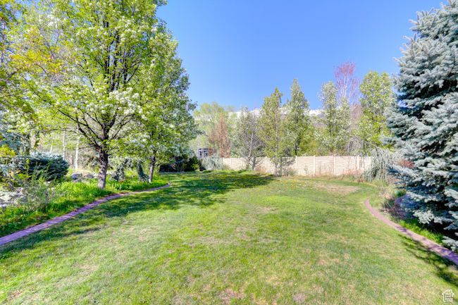 View of yard featuring fence | Image 57