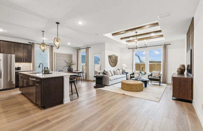 Spacious gathering room*Photos of furnished model. Not actual home. Representative of floor plan. Some options and features may vary | Image 5