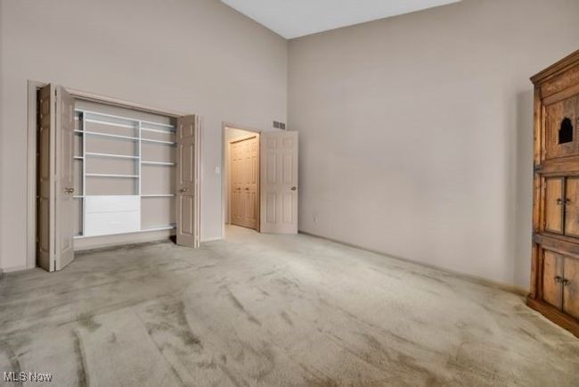 Flex room on first floor has multiple purpose. Can be another bedroom, office, den/study. There is a separate full bath next to it | Image 27