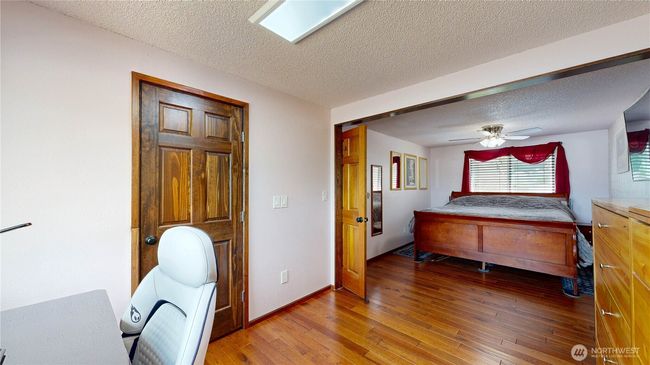Oversized primary suite offers a walk-in closet | Image 6