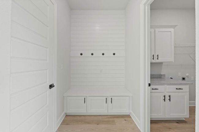 Mudroom and laundry room are conveniently adjacent as you enter from the garage. | Image 10