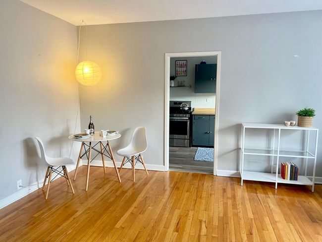 Dining area view into the kitchen, table and 2 chairs included in the sale! | Image 6