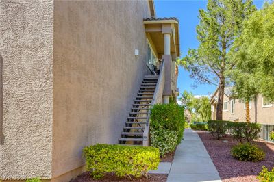 Stairway ascending to Private Main Entrance W/Balcony | Image 2