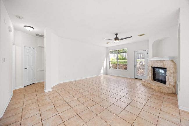 The hallway on the left leads to the master bedroom | Image 9