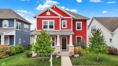 Welcome home to this beautiful crimson red craftsman style home! | Image 1