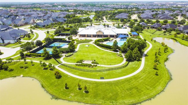 The Bonterra Clubhouse is the community social scene where you can sun yourself by the resort-style pool, cozy up by the fire pit or enjoy a relaxing massage in the spa. There’s also a card and billiards room, an event lawn, bocce and pickle ball courts and more. | Image 28