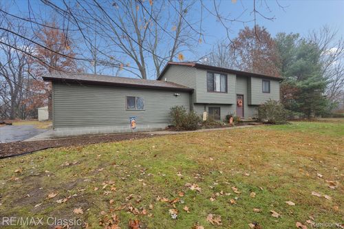 5594 Harper Rd, Holt, MI, 48842-9663 | Card Image