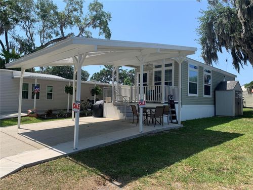 699 Cindi Ave, LEESBURG, FL, 34788-2417 | Card Image