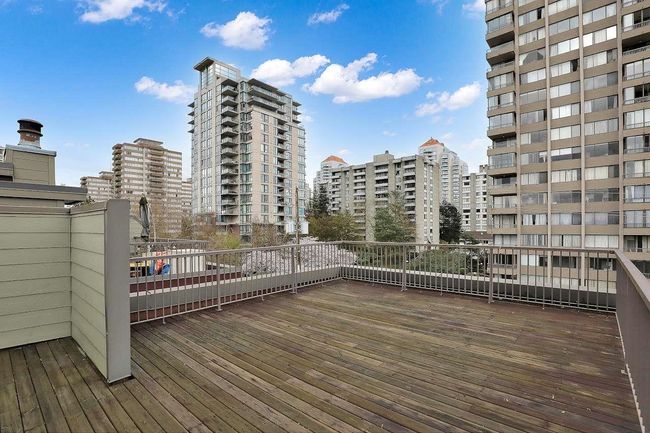 Wooden terrace with a city view | Image 33