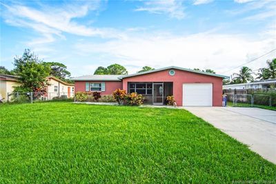 1232 Ne South Street, House other with 3 bedrooms, 2 bathrooms and 1 parking in Jensen Beach FL | Image 2