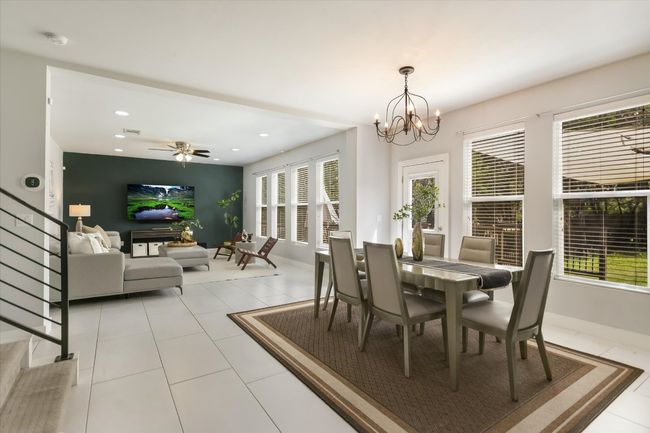 Dining area that flows nicely into the living room and easy access from the kitchen | Image 8