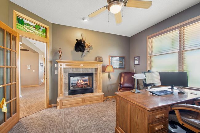Double sided fireplace in Main Floor Bedroom/Office | Image 19
