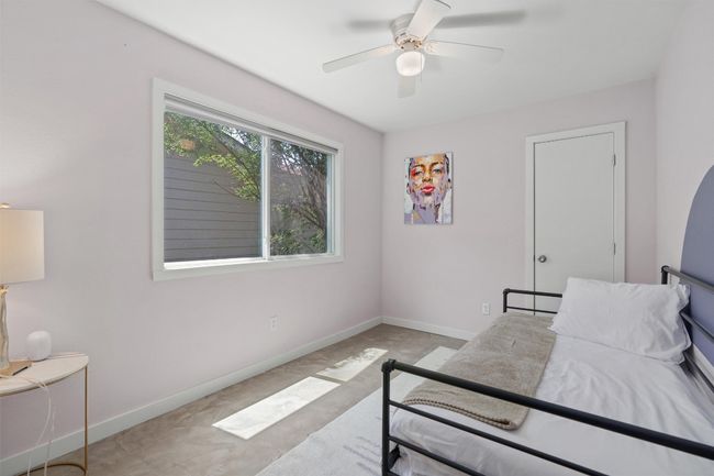 Bedroom featuring baseboards and ceiling fan | Image 21