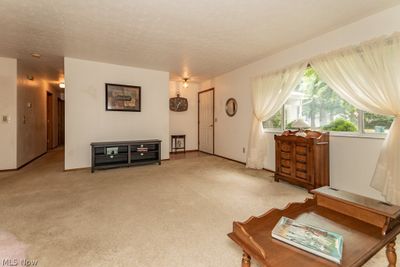 Bright living room with large picture window to the front yard! | Image 3