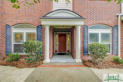 401 River Oaks Drive, Condo with 3 bedrooms, 2 bathrooms and null parking in Richmond Hill GA | Image 1