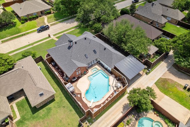 Aerial view of residential area with a pool | Image 37