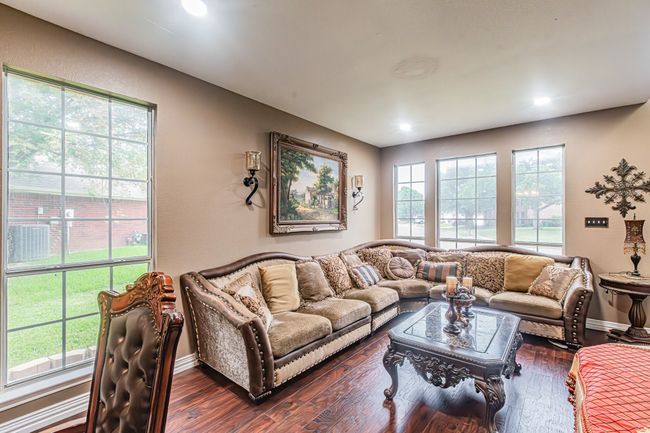 Living room featuring dark wood finished floors and recessed lighting | Image 6