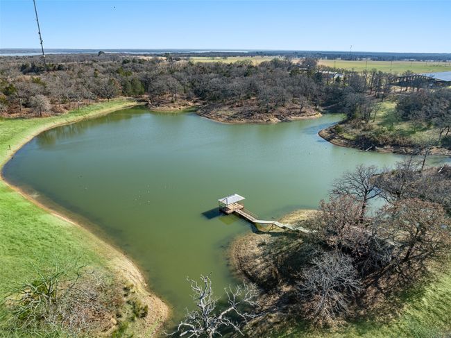 Large pond with fishing pier | Image 30