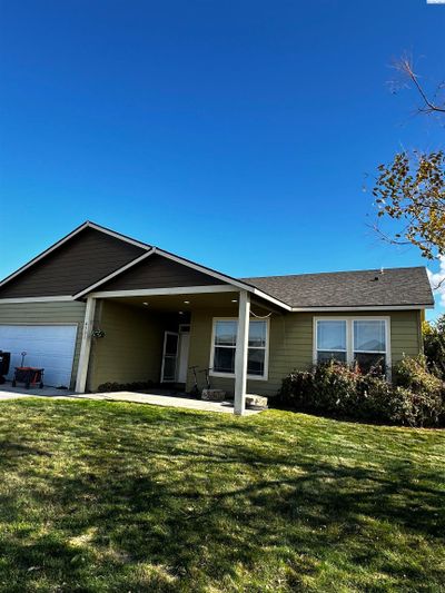 6303 Panther Lane, Home with 3 bedrooms, 2 bathrooms and null parking in Pasco WA | Image 1