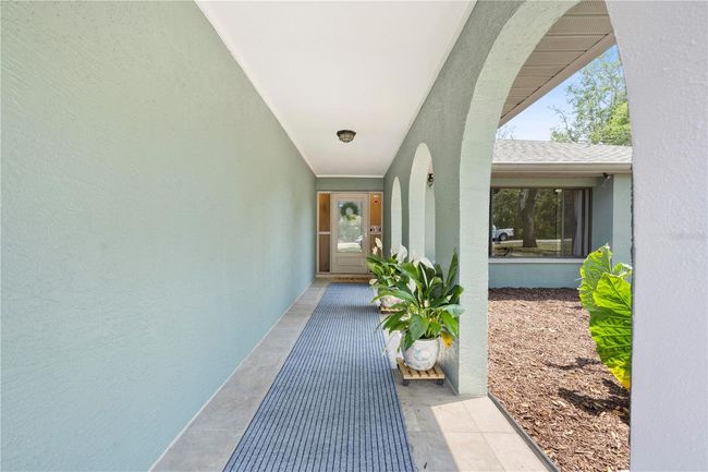 7660 Holiday Dr, House other with 4 bedrooms, 3 bathrooms and null parking in Spring Hill FL | Image 4