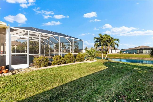 View of yard with a residential view and a water view | Image 35
