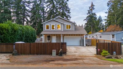 Gated entry with RV parking and spacious entrance. | Image 1