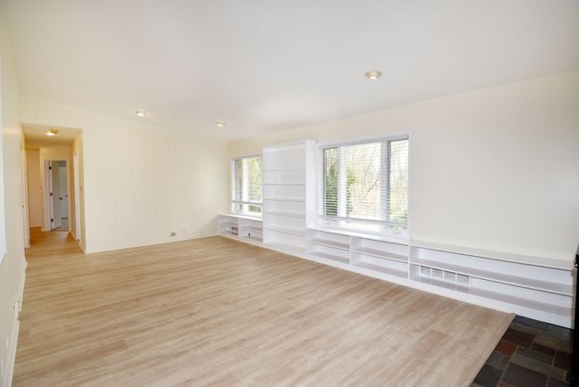 family room features tons on built-ins | Image 9