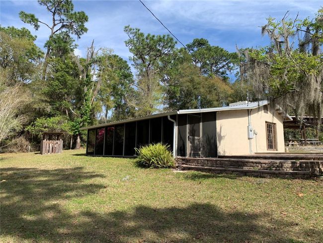 24645 Ne 177 Th Ter, House other with 2 bedrooms, 1 bathrooms and null parking in Fort Mc Coy FL | Image 90