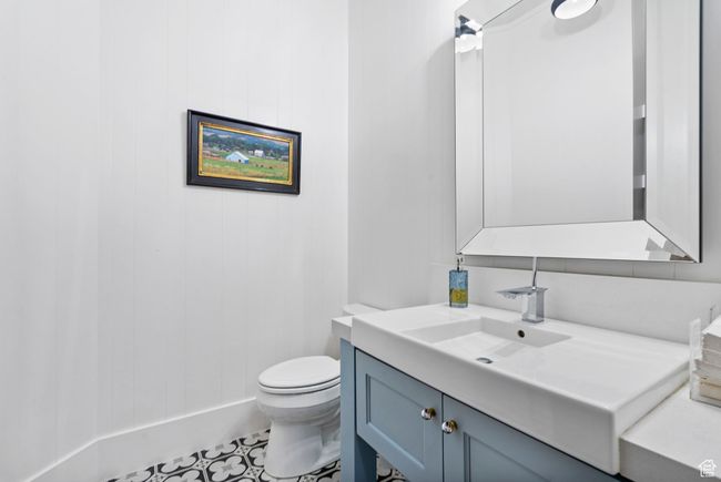 Bathroom featuring tile patterned floors, toilet, and vanity | Image 34