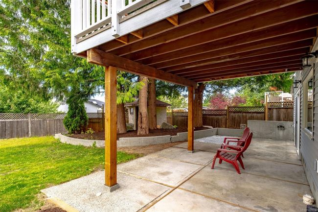 Covered patio and backyard space | Image 61