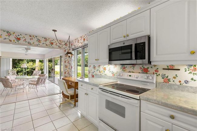 B105 - 105 Wilderness Dr, Condo with 3 bedrooms, 2 bathrooms and 2 parking in NAPLES FL | Image 6