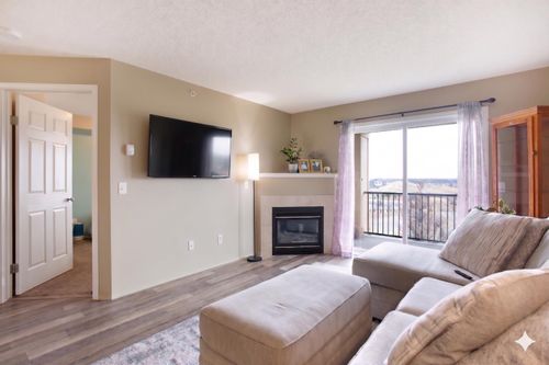 6405-304 Mackenzie Way Sw, Airdrie, AB, T4B3H6 | Card Image