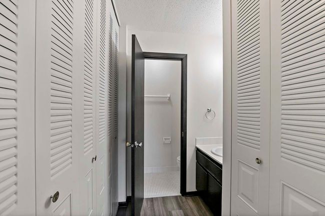 Walk thru closets to bathroom | Image 7