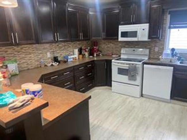 328 Penworth Dr Se, House detached with 5 bedrooms, 2 bathrooms and 4 parking in Calgary AB | Image 5