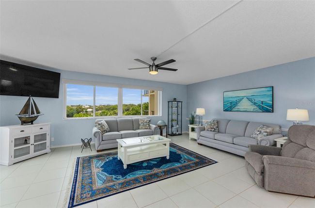 Living room and space for dining room as well. | Image 6