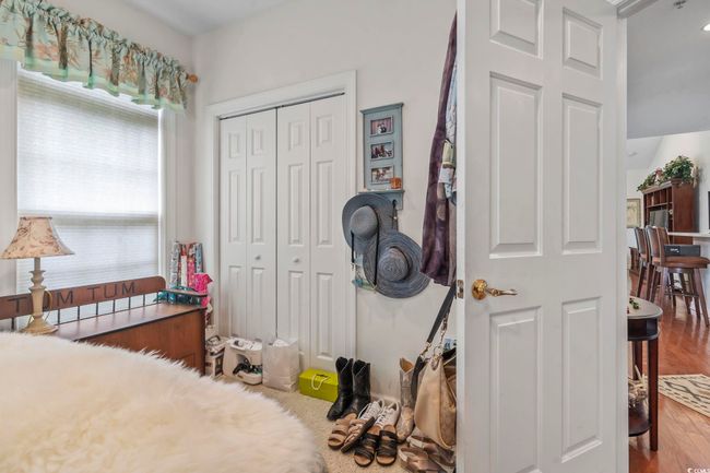 Bedroom featuring a closet | Image 8