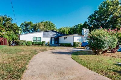 Single story home with a front yard | Image 1