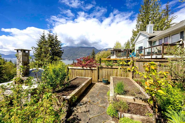 View of yard featuring a garden and a mountain view | Image 28