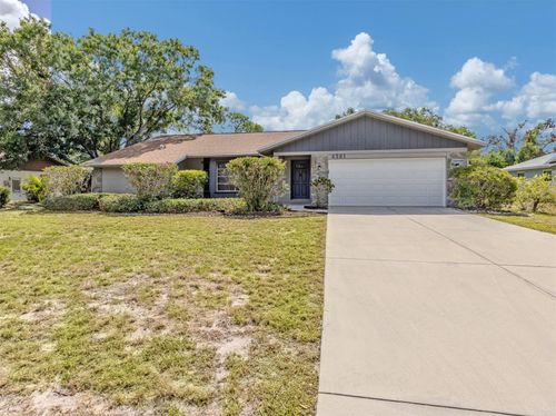 4361 Whispering Woods Pl, SARASOTA, FL, 34233-3628 | Card Image