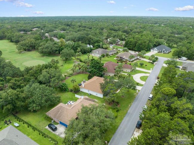7008 Turnberry Cir, House other with 4 bedrooms, 2 bathrooms and 3 parking in Navarre FL | Image 68