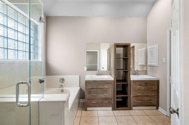 Step into luxury in this primary suite bathroom | Image 22
