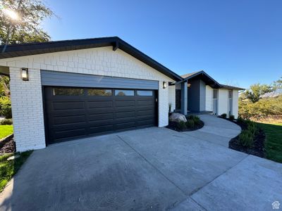 View of front of property with a garage | Image 3