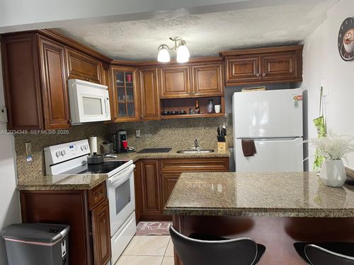 2-111-4275 Nw South Tamiami Canal Dr, Miami, FL, 33126-1461 | Card Image