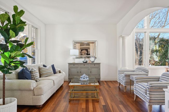 Living room is open and close to dining room to create a seamless flow for entertaining. | Image 7