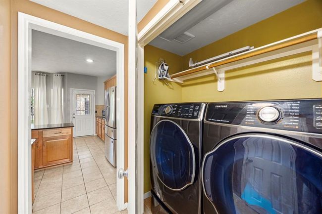 Utility Room, next to half bath and Kitchen. | Image 40
