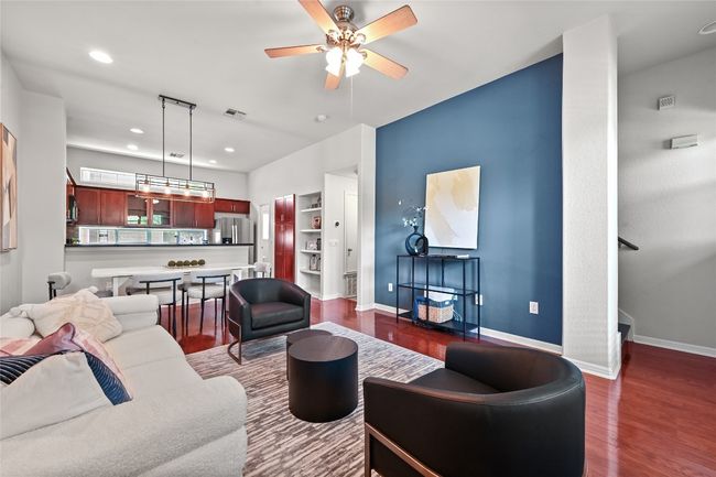 Accent wall matches the accent wall in the primary bedroom for a coordinated pop of​​‌​​​​‌​​‌‌​‌‌​​​‌‌​​‌‌​‌​​​​​‌ color. | Image 9