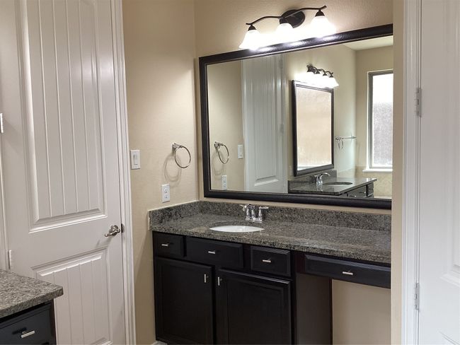 Bathroom featuring vanity | Image 14