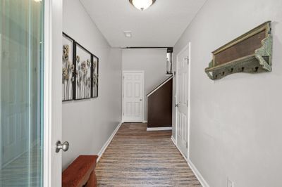 Spacious Entry from front door + garage | Image 2